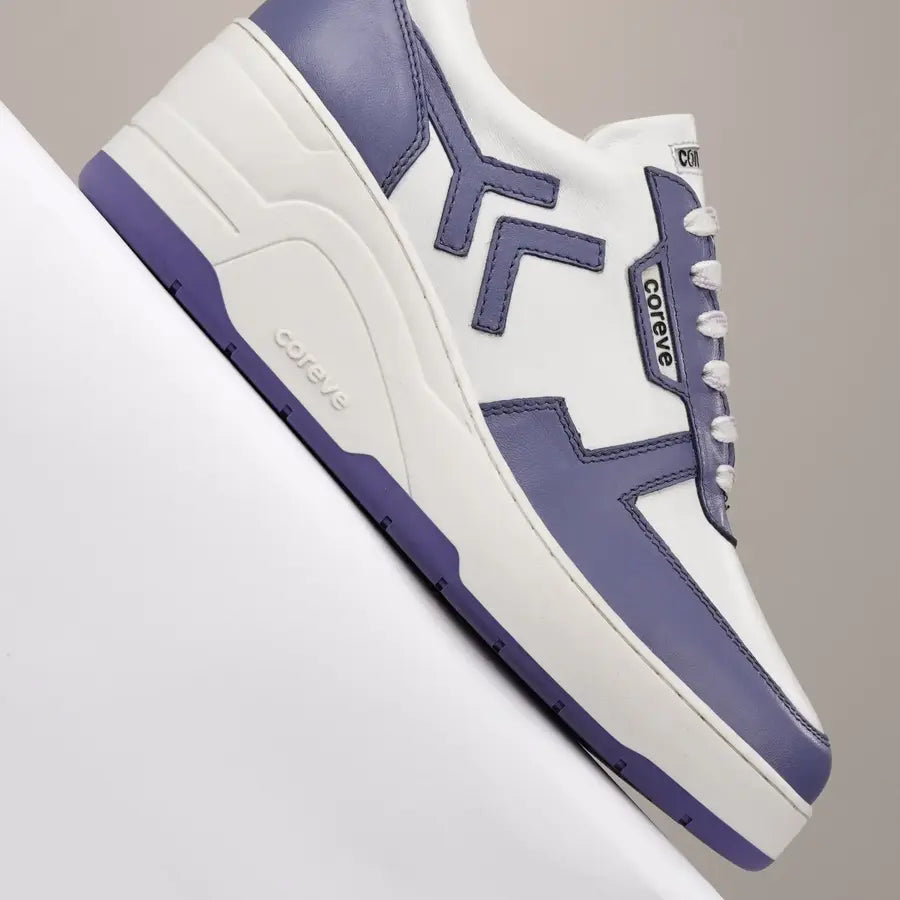 White and purple sneaker with 'Coreve' branding